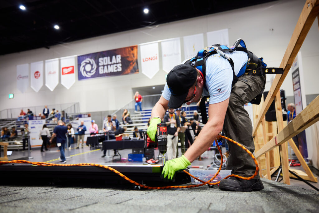 Photo of an installer at the 2024 Solar Games competition