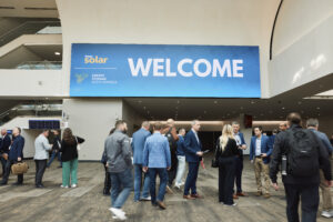 Attendees outside the exhibit hall