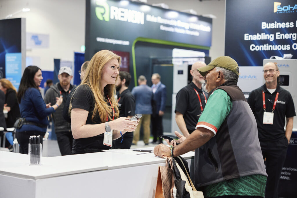 Exhibitor speaks with attendee at IESNA Flagship 2026