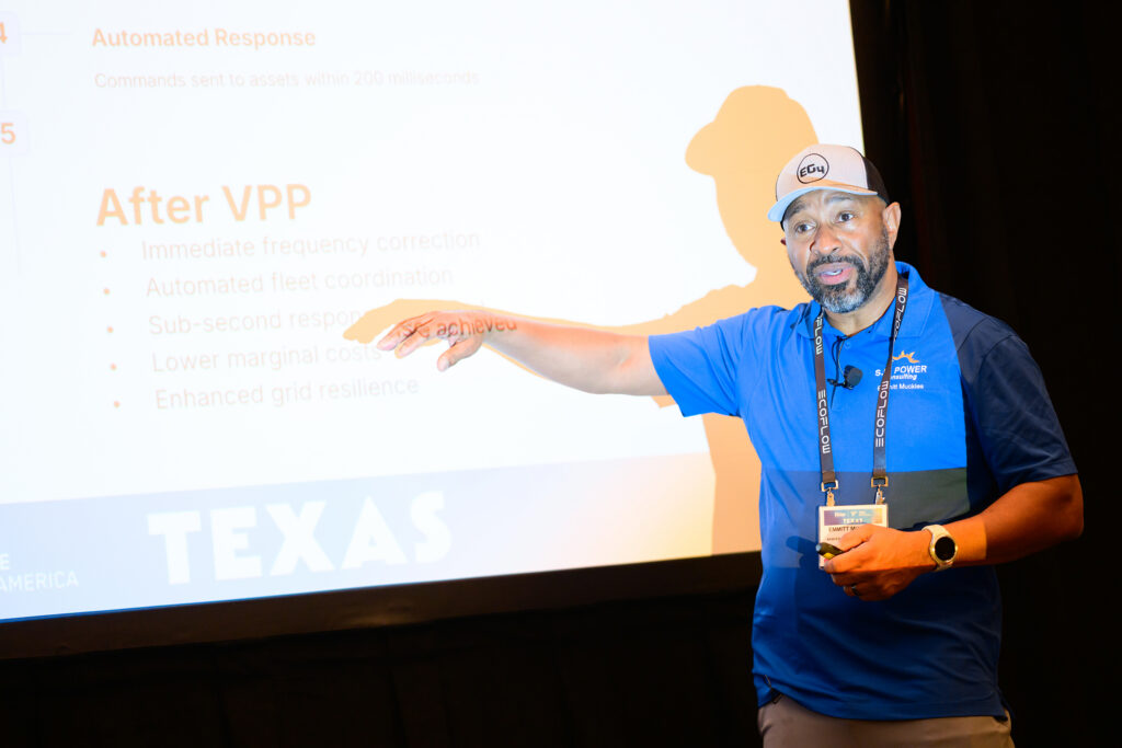 Speaker points at screen during IESNA Texas 2025