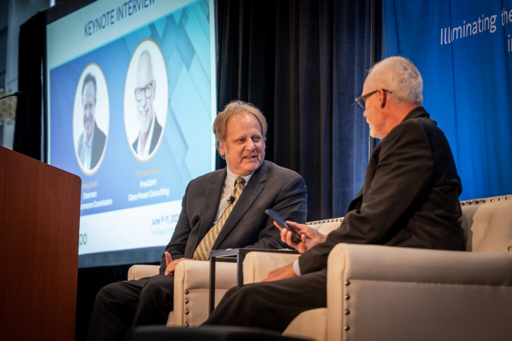 Doug Scott speaks with Tim Montague at IESNA Midwest