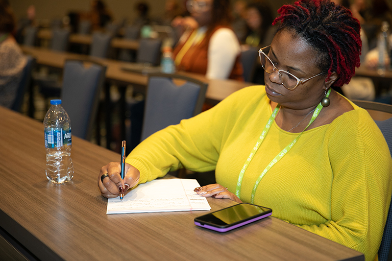 Woman taking notes